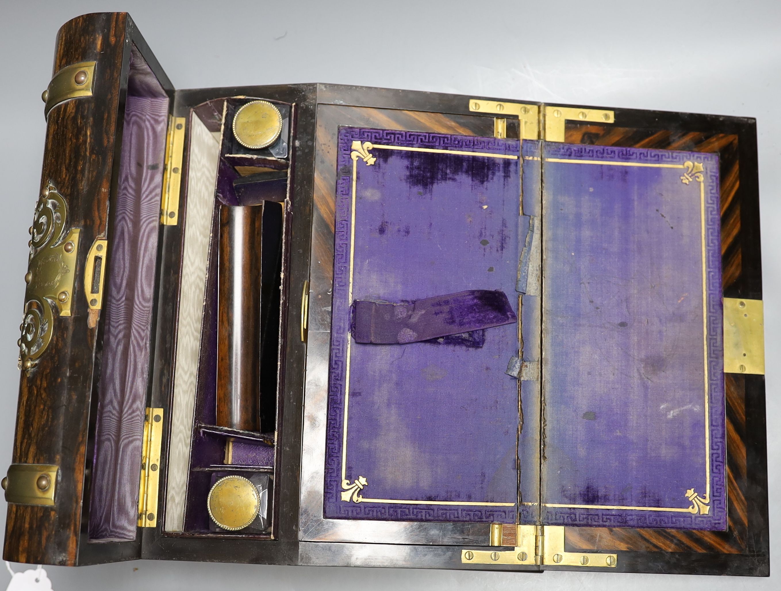 A Victorian coromandel stationery box with brass mounts, 32 cms wide.